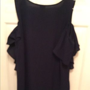 Cold shoulder top.   Never warn